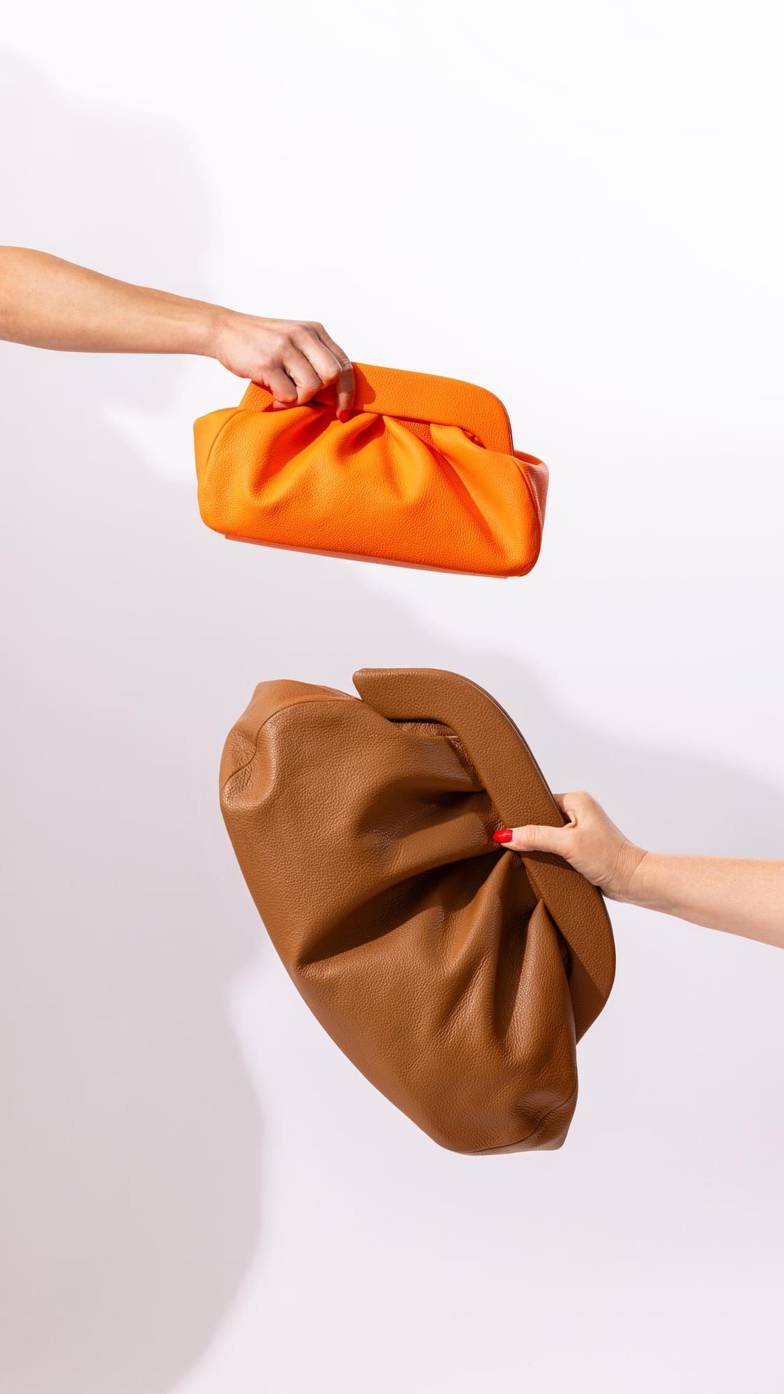 Tri PELEZZE pouch tašne u toplim tonovima
